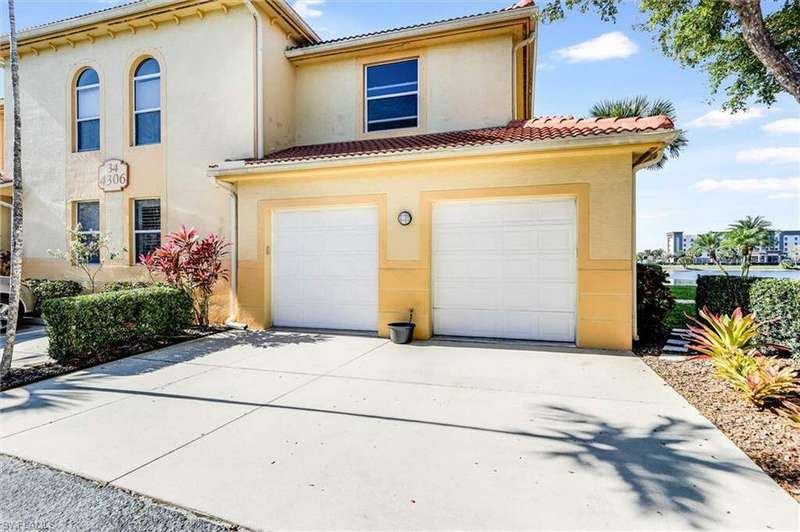 Mediterranean / spanish house featuring concrete driveway, a tiled roof, an attached garage, and stucco siding
