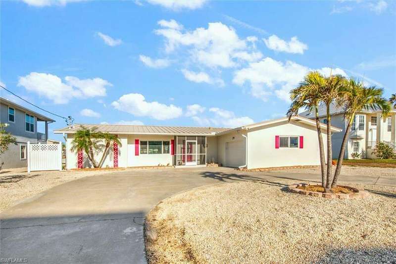 Ranch-style house with a garage
