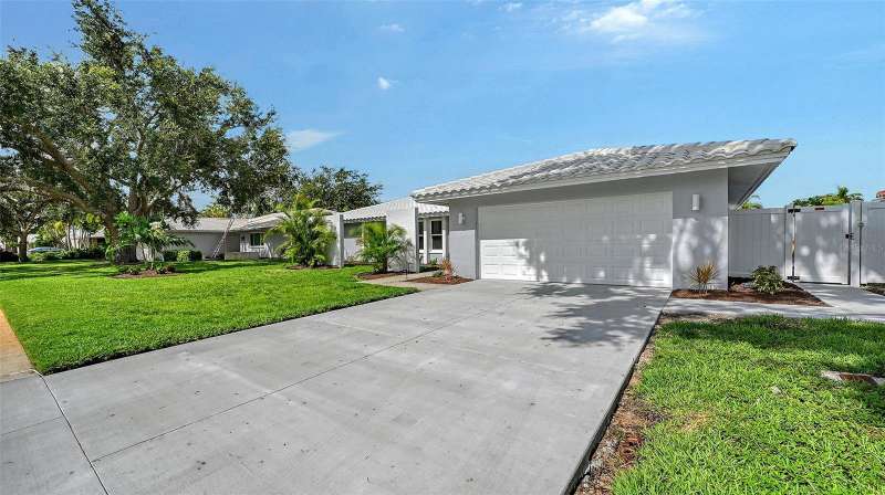 New tile roof, driveway & welcoming curb appeal
