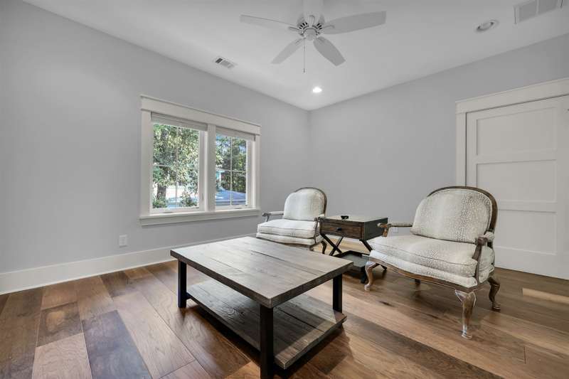 Expansive living room with tabby gas fireplace