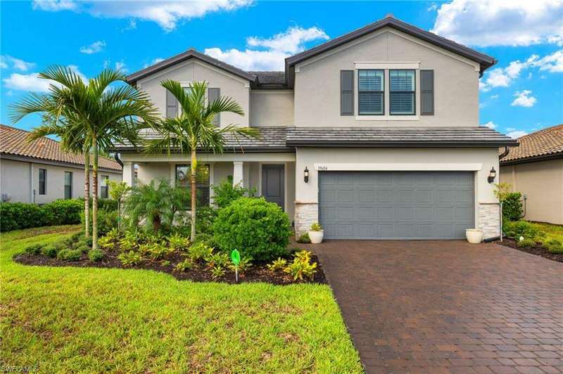 Front of property featuring a garage