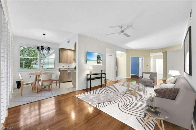 Beautiful, open living area with natural wood floors.