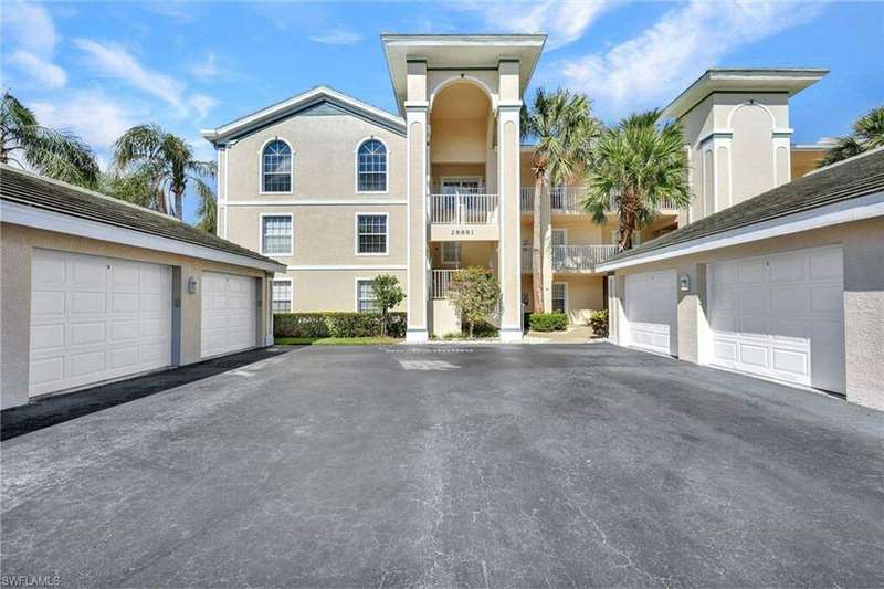 View of front of house with a balcony