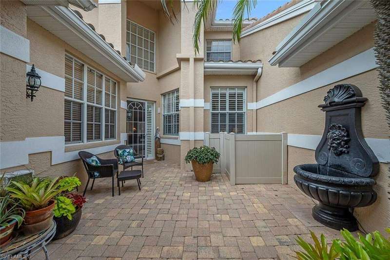 Mediterranean / spanish-style home featuring a garage