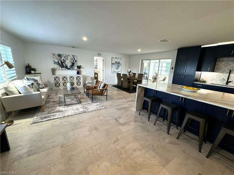 Dining room featuring light tile patterned floors