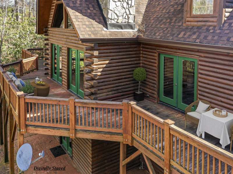 Contemporary Log Cabin with Patio Doors to a Full Length Back Deck