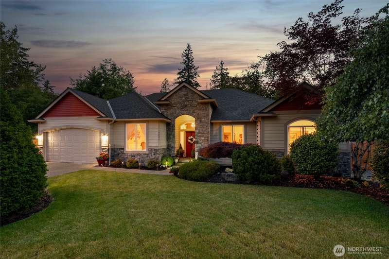 Immaculate rambler nestled in a secure, gated community with undeniable curb appeal.