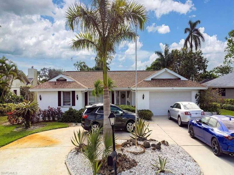 Ranch-style home with a garage