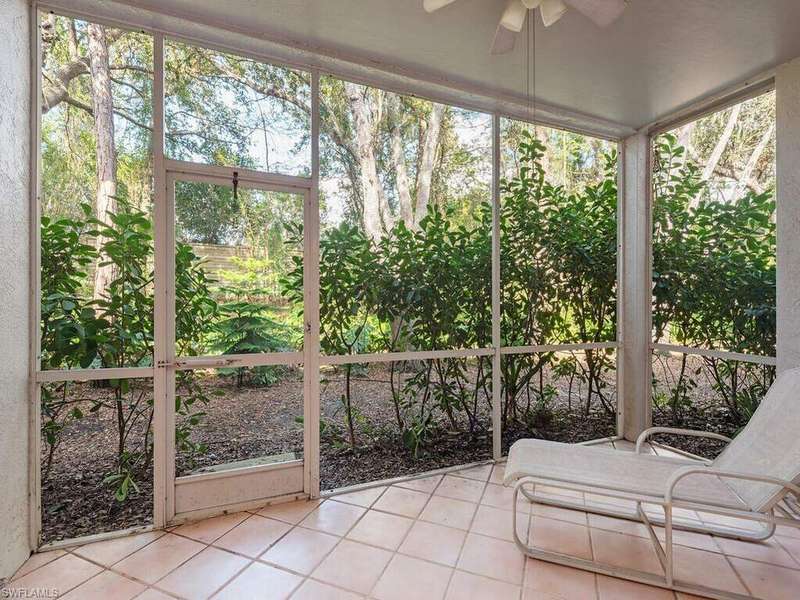 Unfurnished sunroom featuring ceiling fan