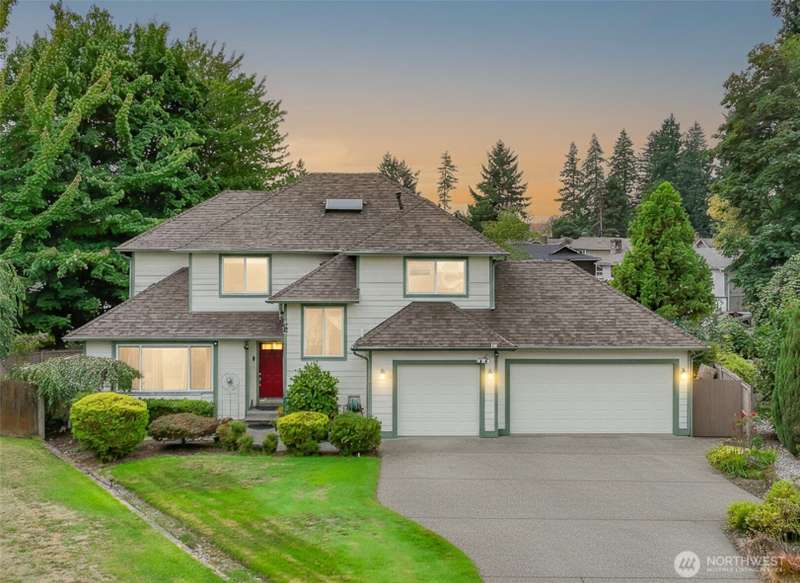 Stunning 4-bed, 2.5-bath  Lee Hill, Auburn home with wide frontage, expansive driveway, 3-car garage, and newer roof with leaf guards!