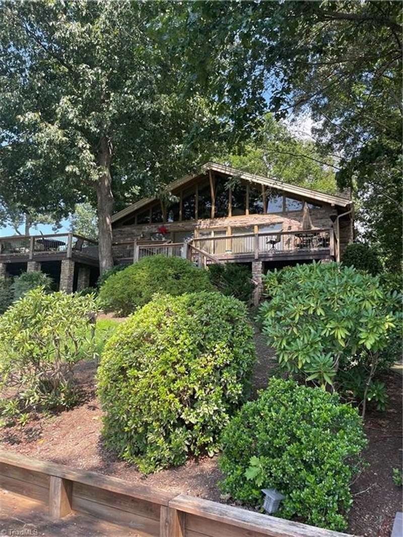 166 Mull Drive, Taylorville NC.   A beautiful 2 bedroom, 2 1/2 bath Waterfront Residence offering plenty of areas both inside and out to unwind and relax. $800,000.00