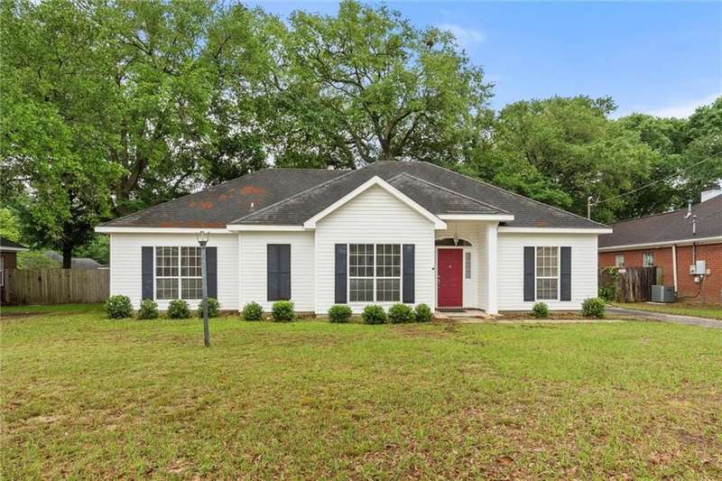 Ranch-style home with central AC unit