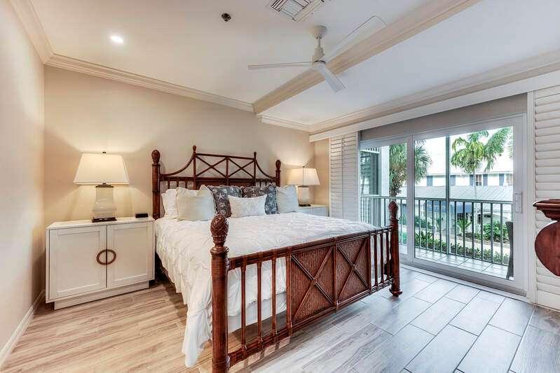 Aerial view of a large body of water and apartment complex / building