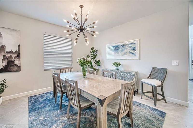 Lovely open floor plan with view of kitchen, dining area and living room.