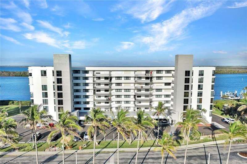 View of building exterior featuring a water view