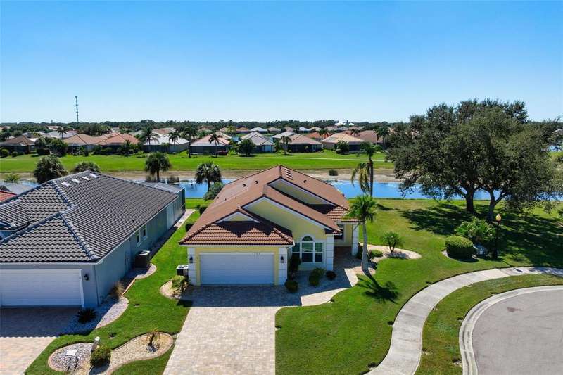 Extra wide lot, water and golf course setting