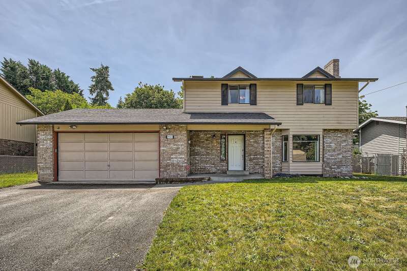 Front of home w/ 2 car garage