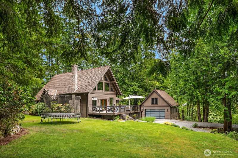 Extraordinary 4,098 sq. ft. multi-level home nestled on 2.5 private acres with high-end upgrades.