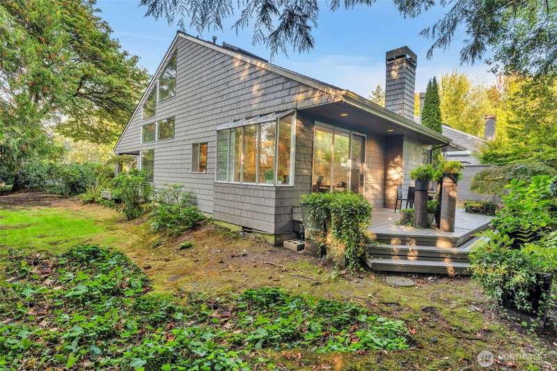 Tucked away on a private cul-de-sac, this Avant Place home is flooded with natural light from a multitude of windows and skylights that illuminate the spaces thru out the day