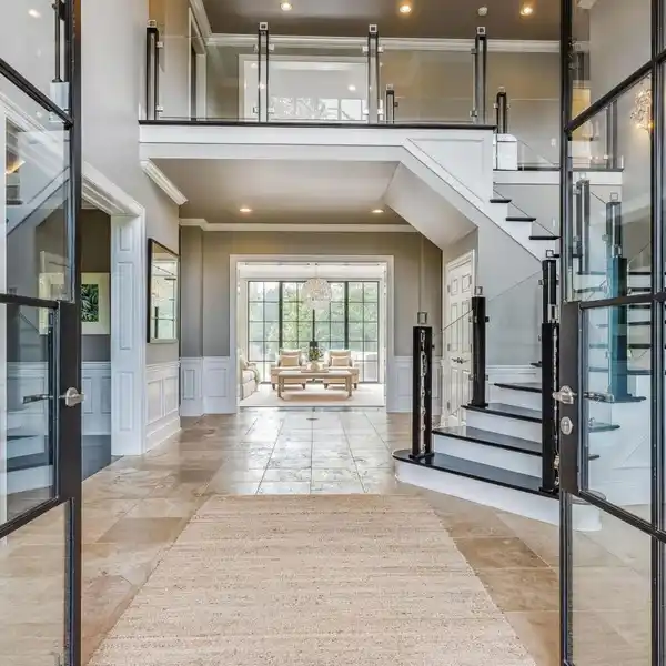 Custom Home on 6.1 Acres with Stocked Pond and Arena