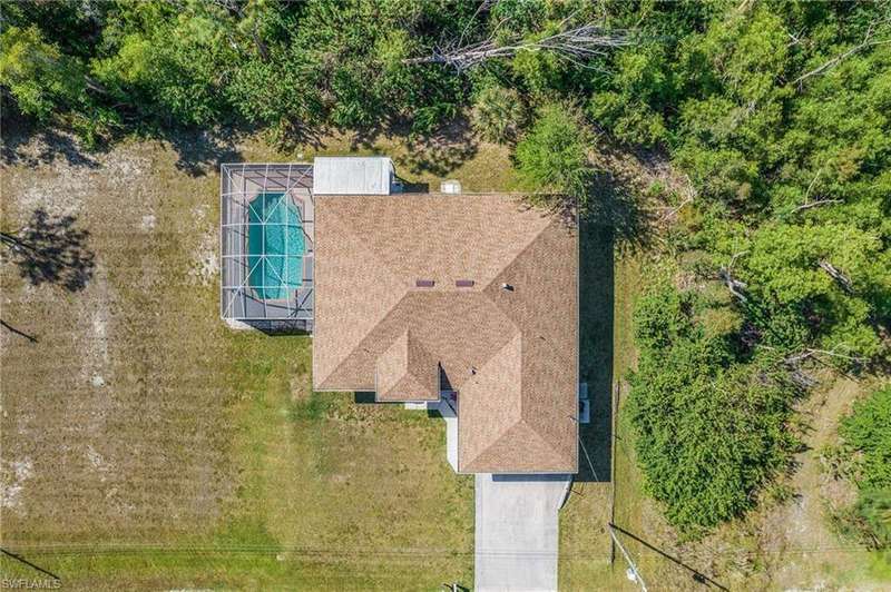 Includes lot to the left.