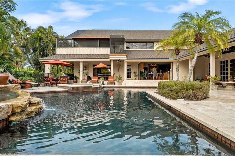 View of swimming pool featuring an in ground hot tub and a patio
