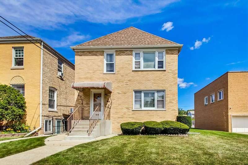 full brick building with newer tear off roof and g