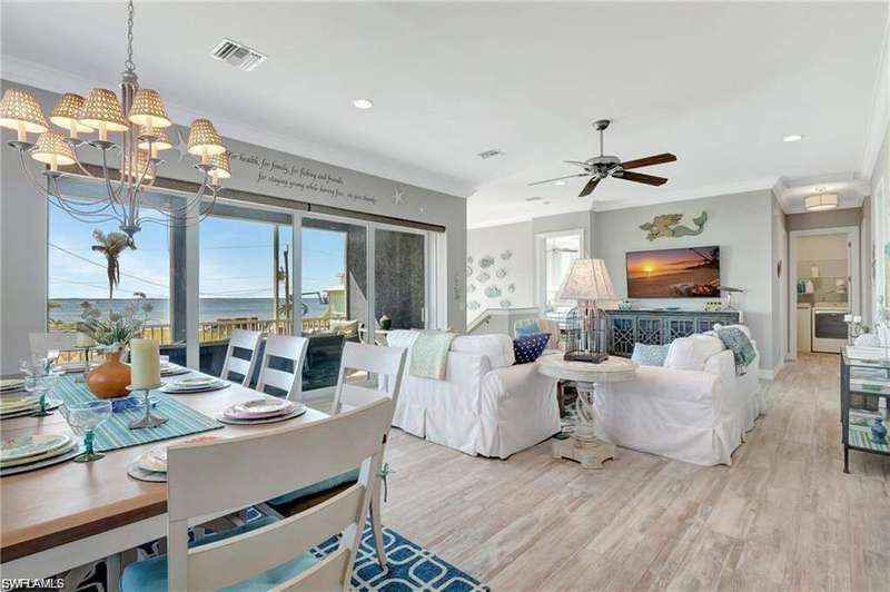 Aerial view with a water view and a residential view