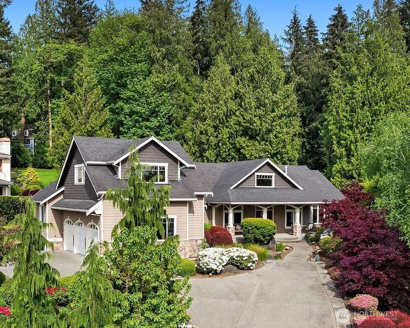 This custom home ,on a shy acre, was meticulously designed and maintained. Positioned on top of the hill and facing west, the home enjoys maximum light exposure throughout the year
