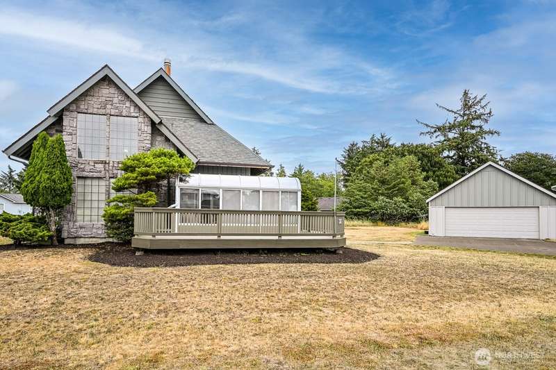 Located in the center of three lots in a quiet neighborhood just minutes from the bay and the lake.