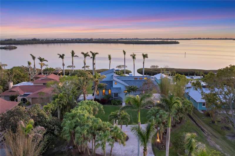 Aerial of home with views of Paradise Bay