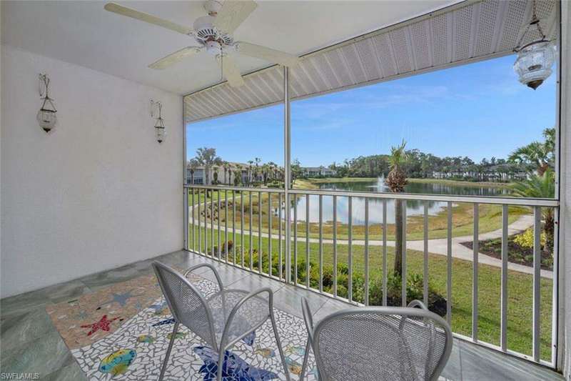 Screened in patio with a lovely lake view