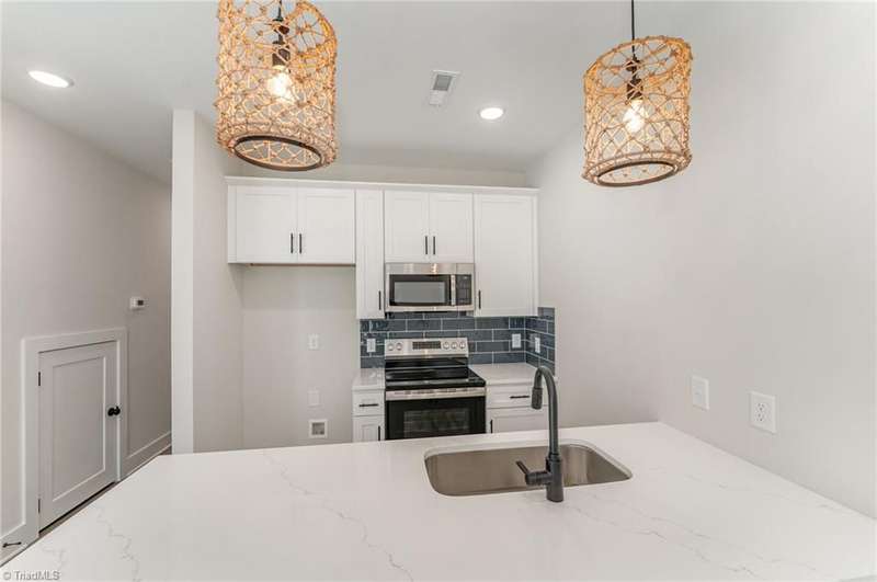 photos of a Hartford plan with different finishes