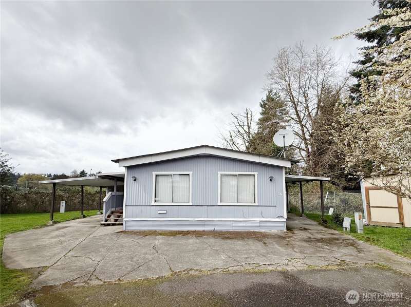 Unit 36, Tucked Away in the back of the neighborhood in a quiet cul-de-sac, with covered parking spaces on both sides