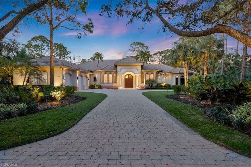 Sprawling Standout Estate Illuminated at Twilight