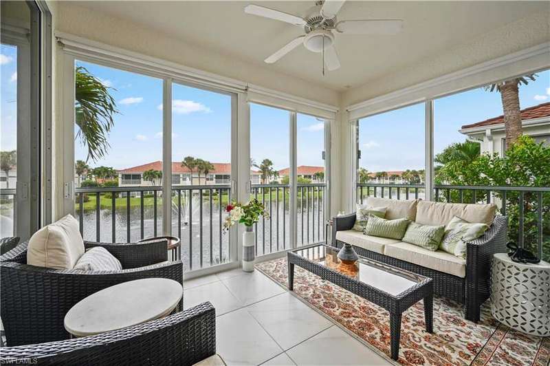 Sunroom / solarium featuring ceiling fan and plenty of natural light