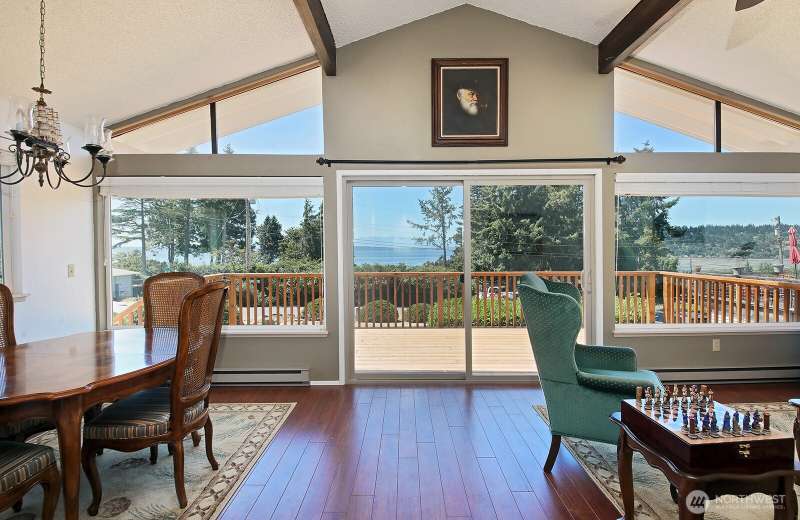 Metal roof and plenty of yard space. Enjoy stunning sunsets and ship action through Admiralty's Inlet.