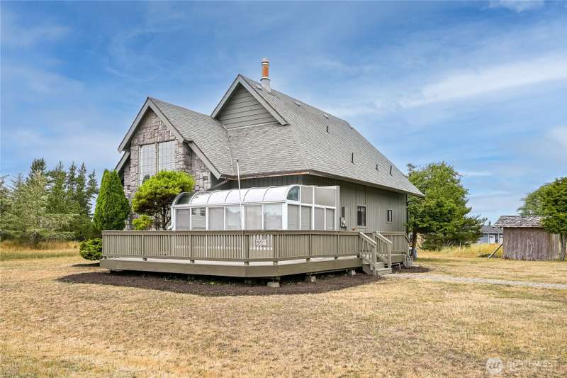 Located in the center of three lots in a quiet neighborhood just minutes from the bay and the lake.