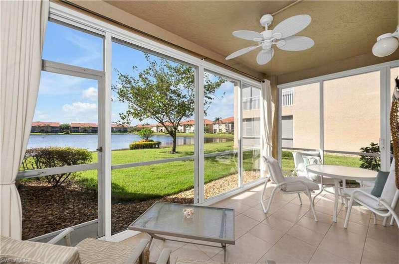 Lanai with water view and ceiling fan