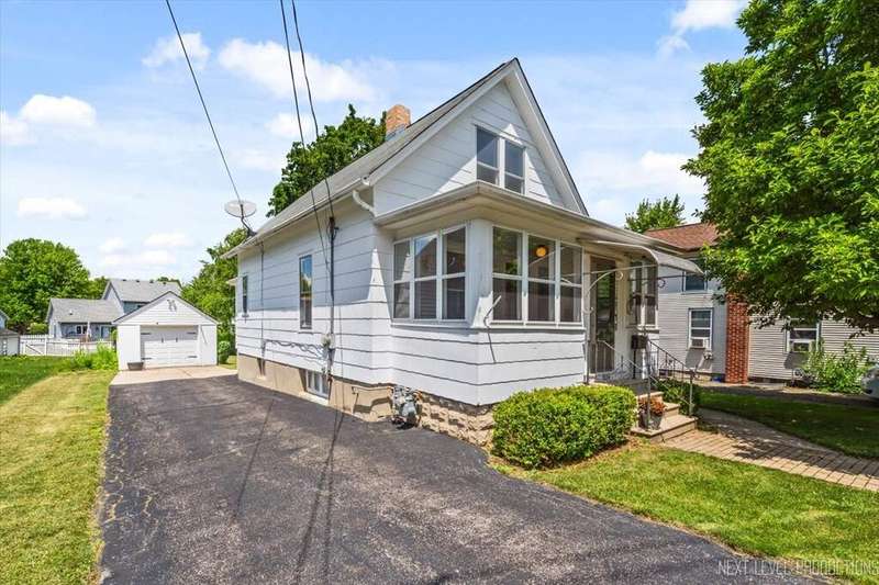 Welcome to 1224 Dean St in St Charles, a classic s