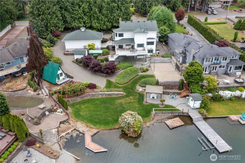 Rare opportunity to own this Lake Tapps waterfront homestead