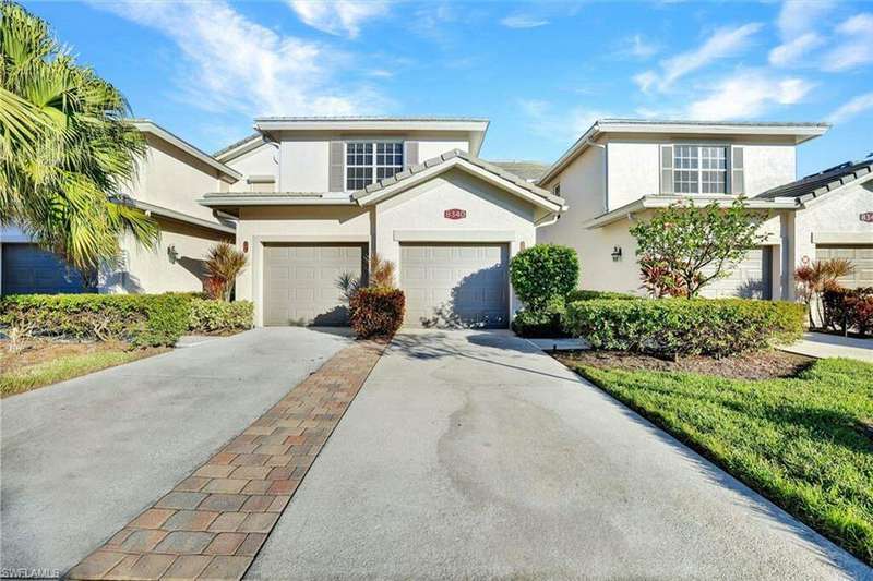 Front of property with a garage