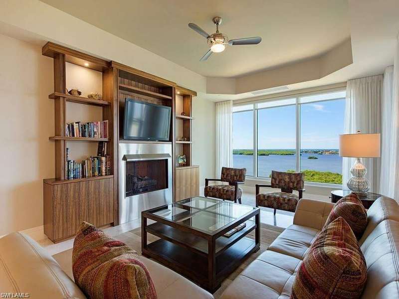 Gas fireplace, large casement windows overlooking gulf and Bay