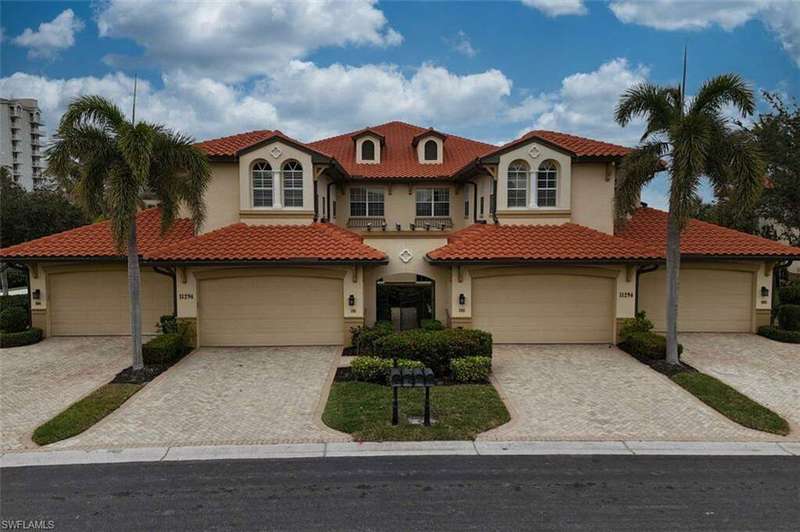 Mediterranean / spanish-style home featuring a garage