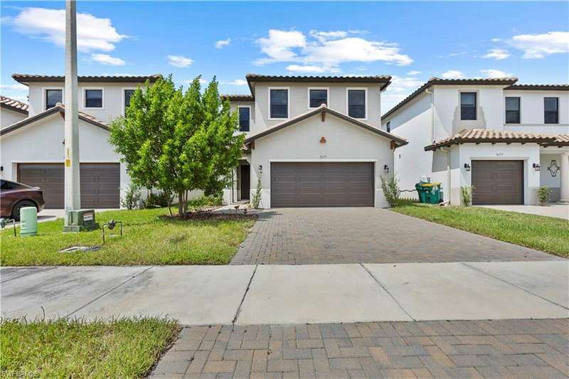 Mediterranean / spanish-style home featuring a garage