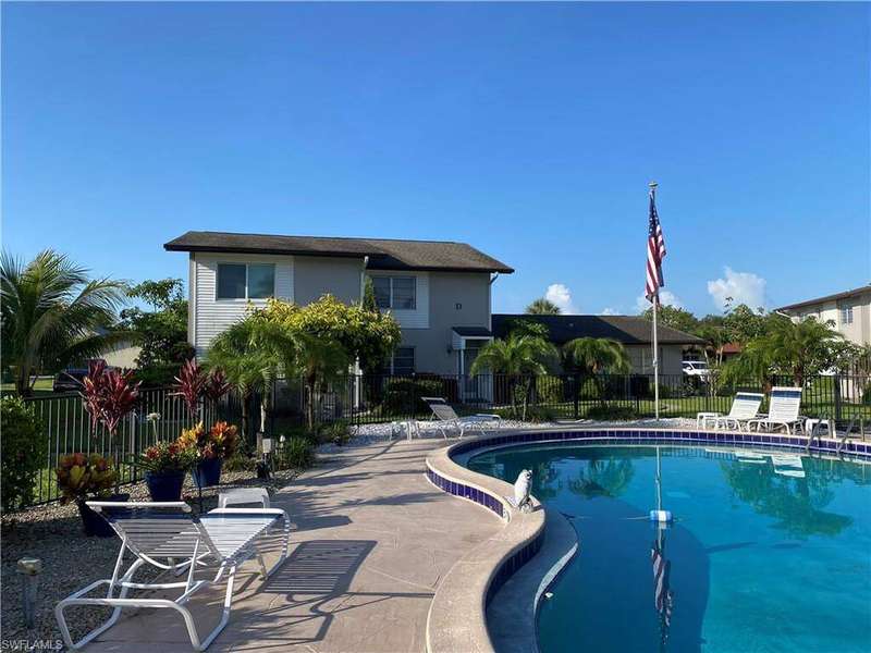 Community pool featuring a patio area