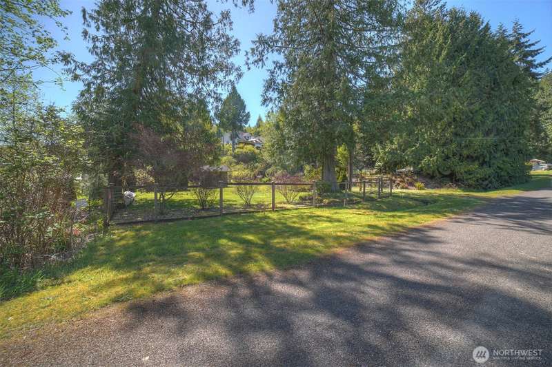 A paved road approaches this beautiful setting.