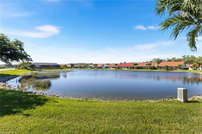 Water view with nearby suburban area