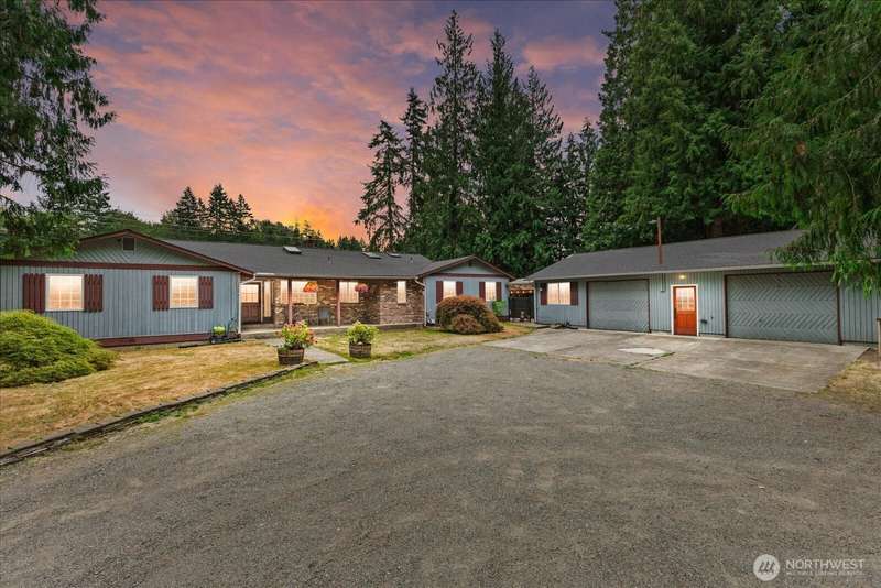 Serene outdoor setting with plenty of space to enjoy fresh air, gatherings, or quiet moments in nature. Custom built single story rambler home with detached 3 car garage and an apartment suite.