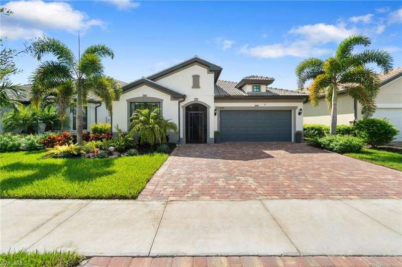 Front Elevation - paver driveway to park 3 cars w/beautiful landscaping